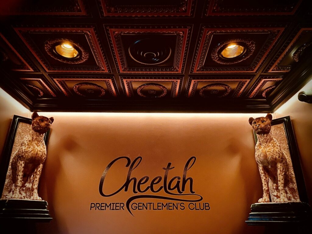 Cheetah-Lex-indoor-sign-w-statues-scaled (1)